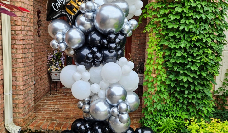 Grab and Go graduation balloon column in black, white, and silver with celebratory foil topper, perfect for quick and stylish event décor by Fabyoulista in Warner Robins, GA.